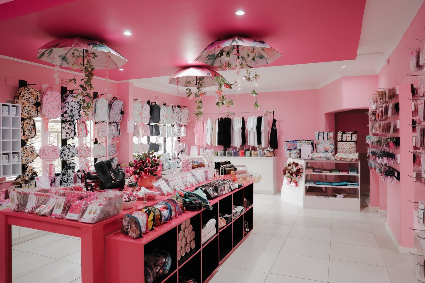 Inside the Wild Mongoo shop in George, its pink shelves full of handmade gifts and kids notebooks